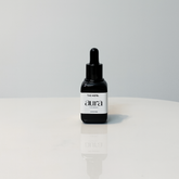 AURA Beard Perfume bottle with a sleek, modern design and a dark, sophisticated label.