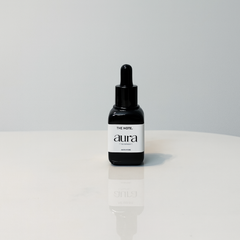 AURA Beard Perfume bottle with a sleek, modern design and a dark, sophisticated label.